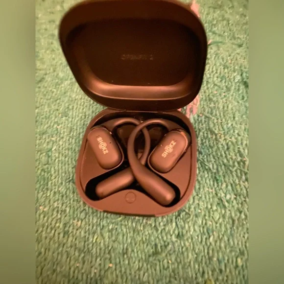 Shokz Black Earbud Case w/ earbuds - Picture 3 of 3